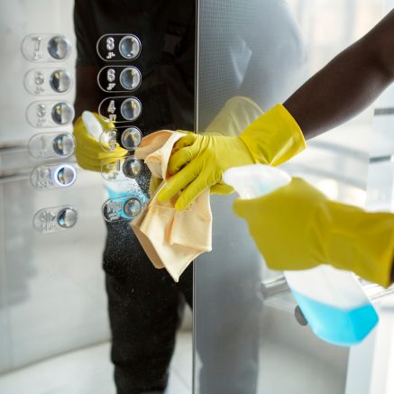 hands-cleaning-elevator-buttons hands-cleaning-elevator-buttons